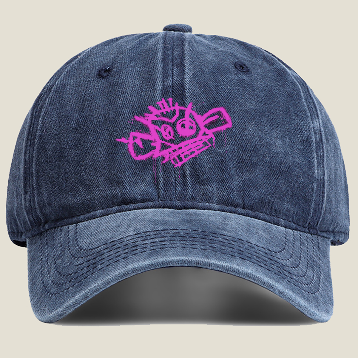 Graffiti-style pink skull with crown and crossbones on black background - Washed Denim - Baseball Cap
