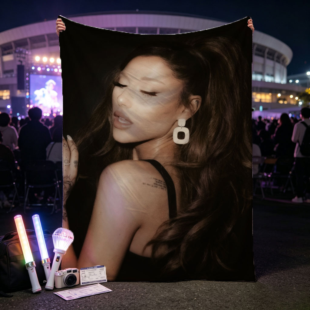 Ariana Grande in a Dramatic Pose with Long Hair and Tattoos on Dark Background - Blankets