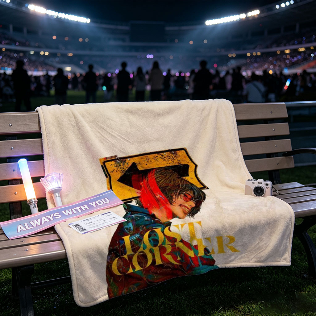 Lost Corner Artist in Colorful Jacket with Arrow Sign and Text Overlay - Blankets