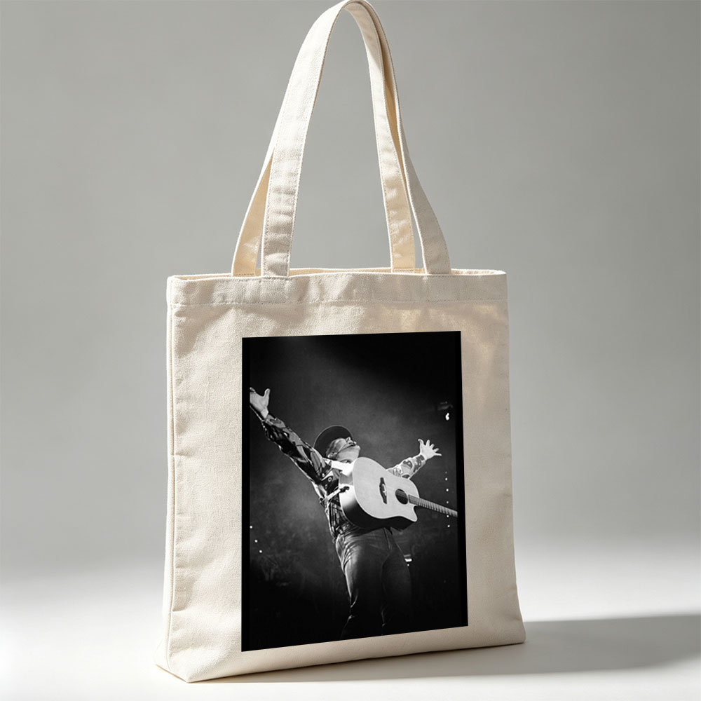 Johnny Cash Performing on Stage with Acoustic Guitar and Arms Raised - Canvas tote bags