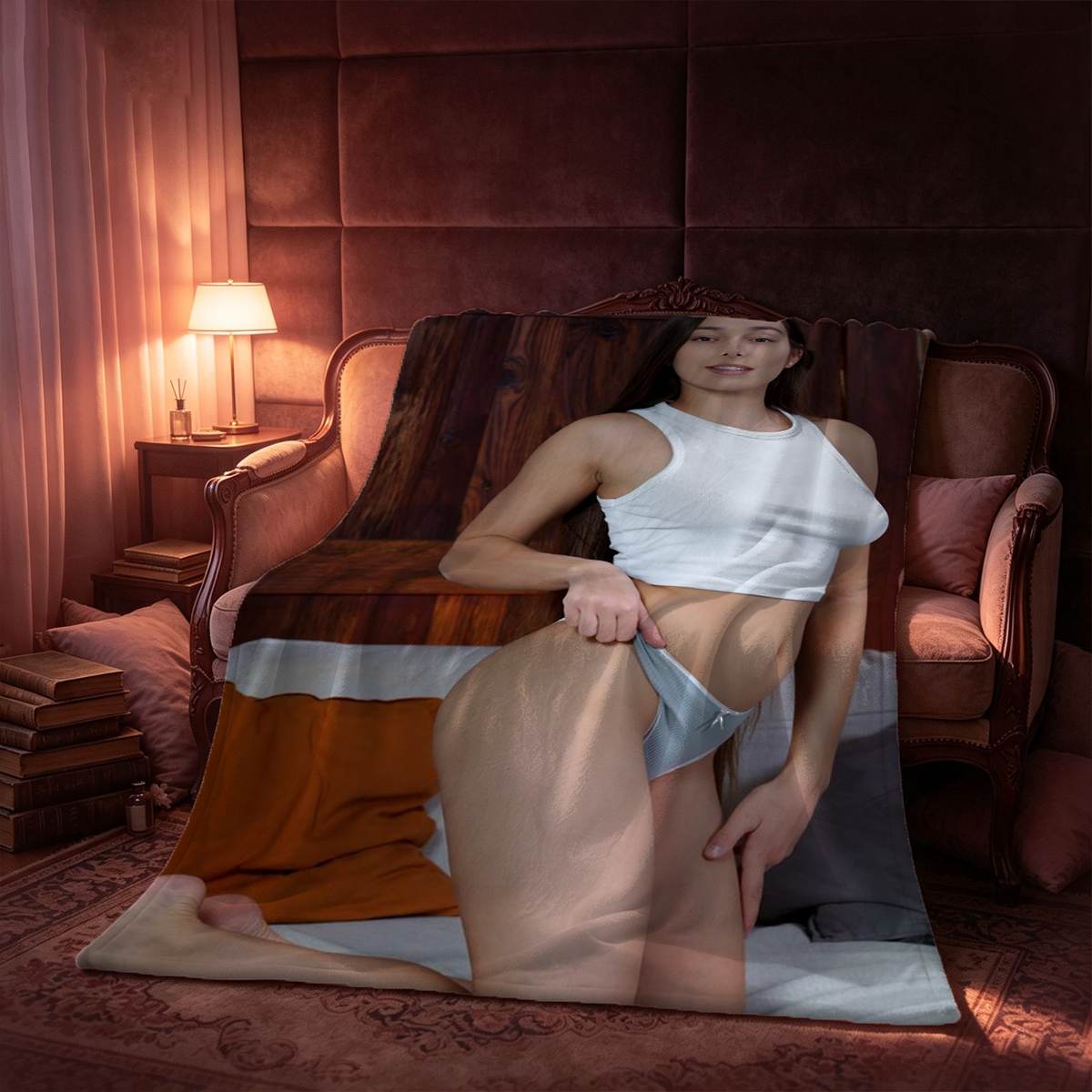 Two Nude Beauties Embracing on Blue Sofa - Blanket