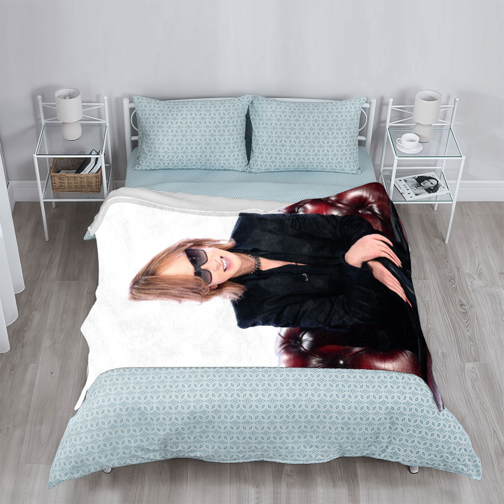 Yoshiki from X Japan Sitting on a Red Leather Couch Wearing Sunglasses and a Black Suit - Blankets