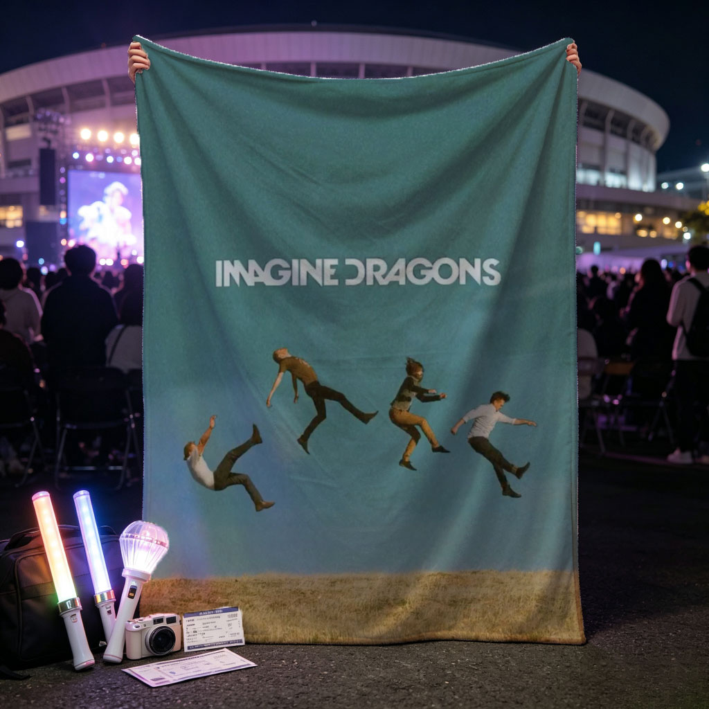Imagine Dragons Band Members Jumping in a Field Under Blue Sky - Blankets