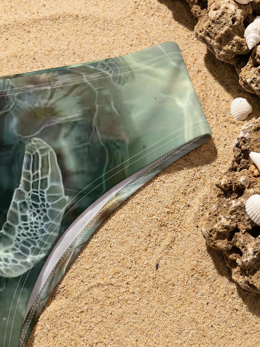 Sea turtles swimming in clear water -  Men's swim trunks