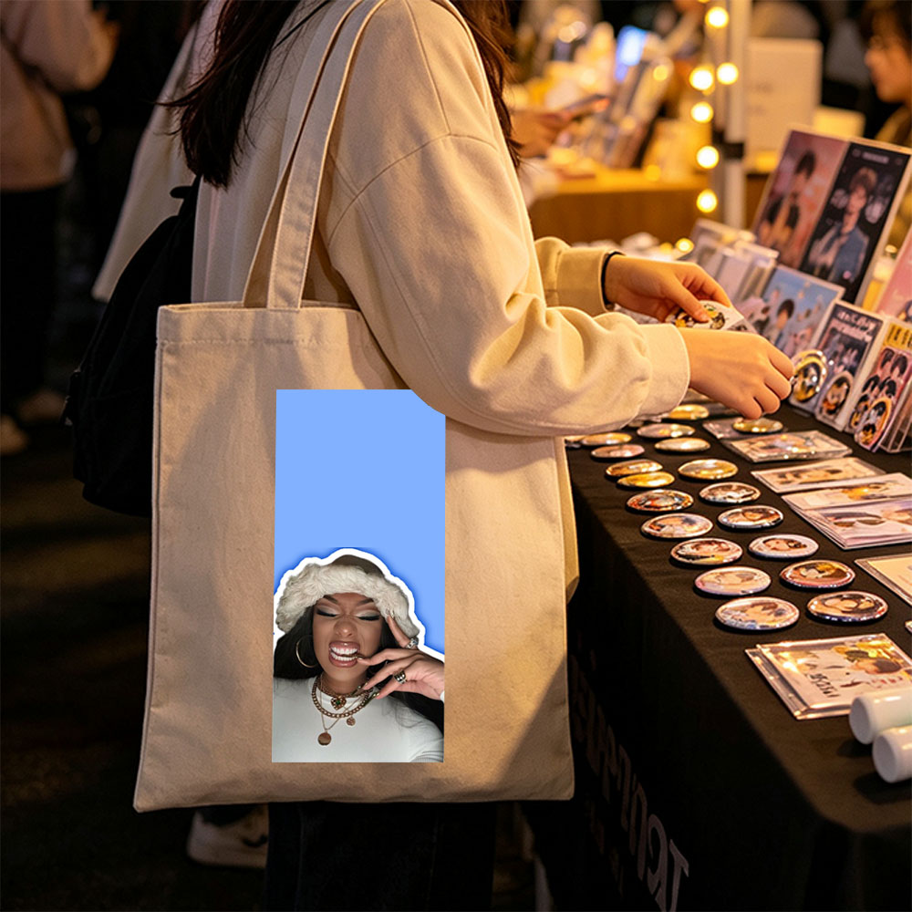 Doja Cat in Festive Mood Wearing Fur Hat and Gold Jewelry Against Blue Background - Canvas tote bags