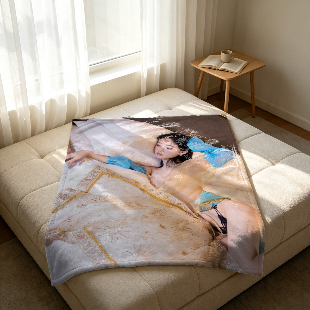 Nude brunette kneeling on gray couch in attic, back arched, long wavy hair cascading down her back. - Blanket