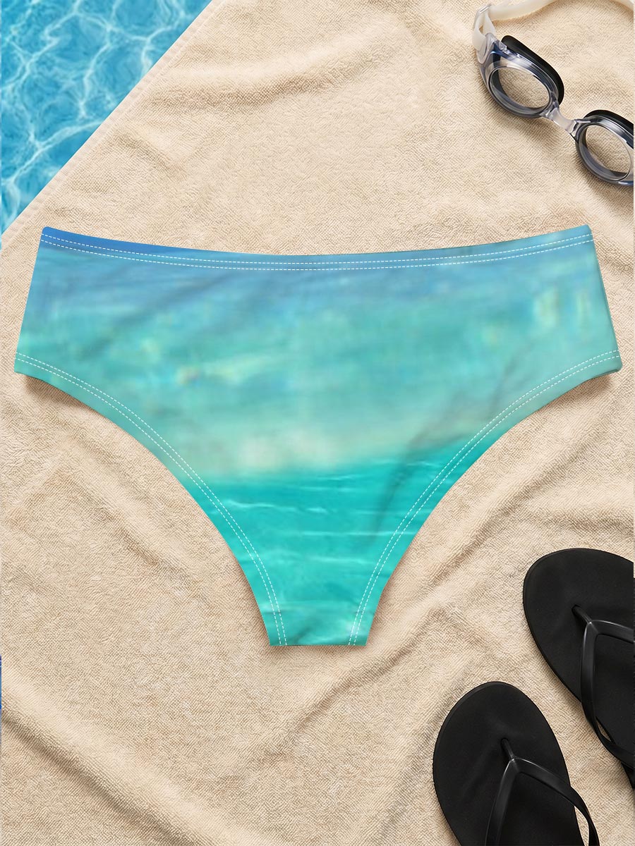 Sea turtle swims in crystal-clear turquoise waters near a tropical island. -  Men's swim trunks