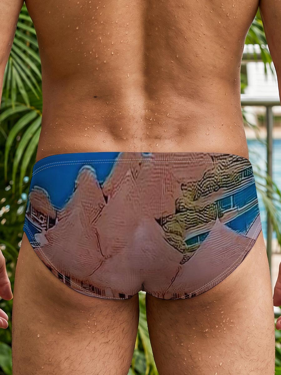 Overwater bungalows with private pools on a tropical island, surrounded by crystal blue waters and lush greenery. -  Men's swim trunks