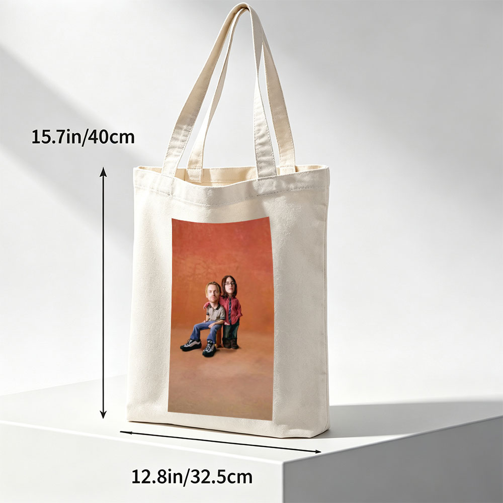 Phil and Lil from Blue's Clues - Life-Size Figures in a Studio Setting with Warm Background - Canvas tote bags