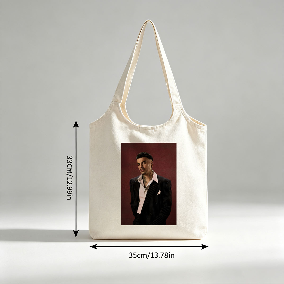 Maluma in a Pinstripe Suit Against a Deep Red Background - Canvas shoulder bags/