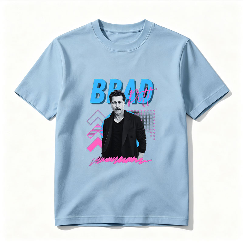 Brad Pitt in a stylish black suit against a vibrant graphic background with bold text and geometric patterns. - Tee