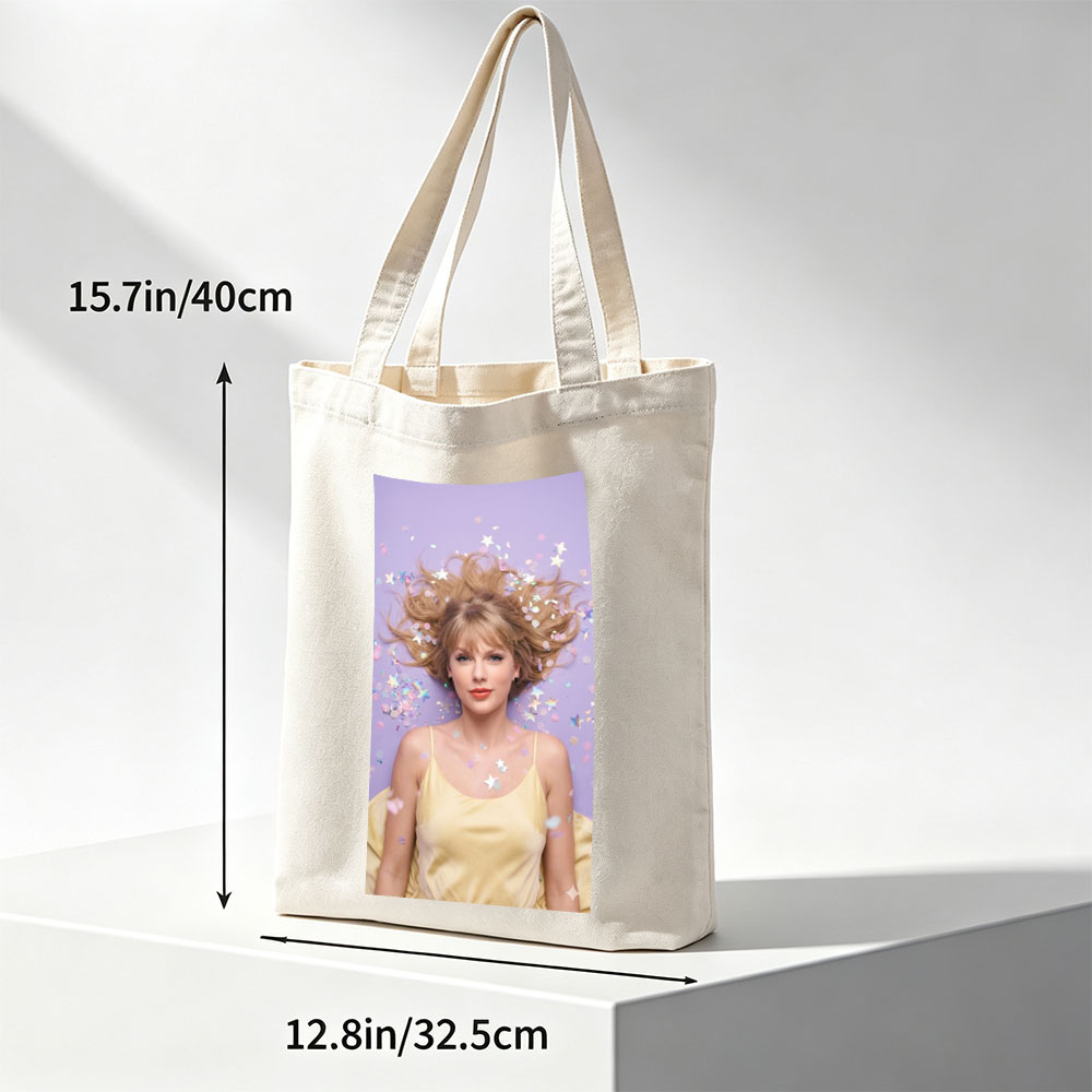 Taylor Swift Lying on Purple Background with Confetti and Stars Around Her Hair - Canvas tote bags