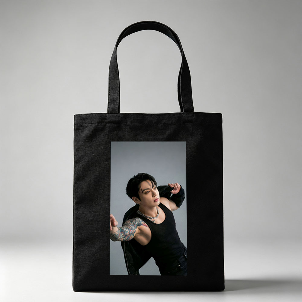 BTS Jungkook in a Powerful Pose with Tattooed Arm and Black Tank Top - Canvas tote bags