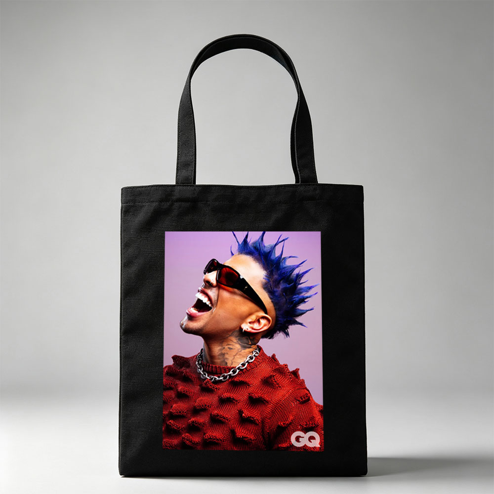 Daddy Yankee in a Bold Red Sweater with Spiky Blue Hair and Sunglasses, Laughing Loudly Against a Purple Background - Canvas tote bags