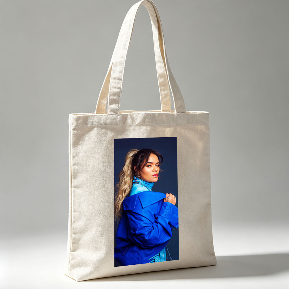 Rita Ora in Bold Blue Fashion Pose Against Dark Background - Canvas tote bags