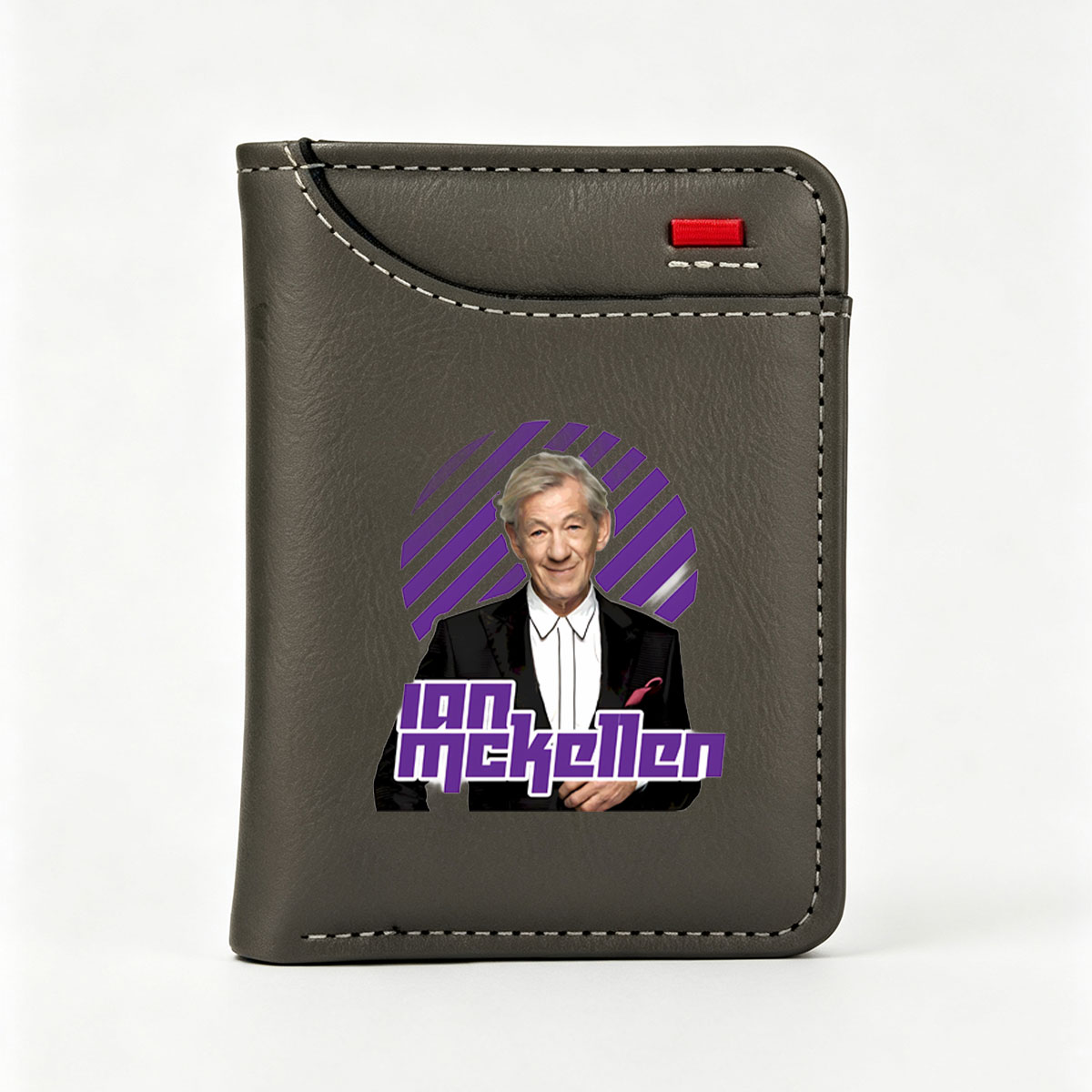 Ian McKellen in a formal suit with a purple and black striped background - Vertical Style Wallet