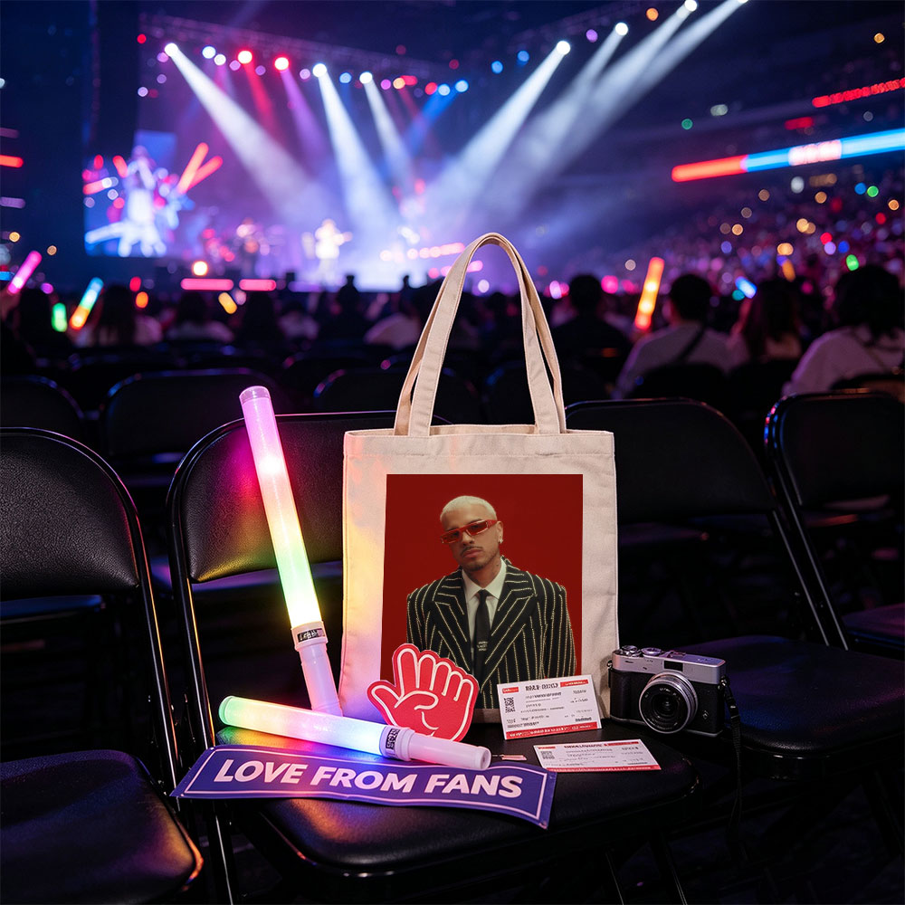 J Balvin in a Striking Red-Background Portrait Wearing a Glittering Black Suit and Red Sunglasses - Canvas tote bags
