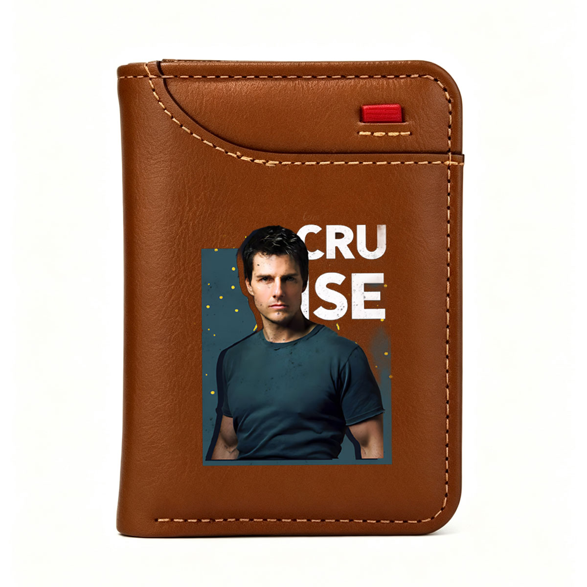 Tom Cruise in a dark blue t-shirt, intense gaze, bold text 