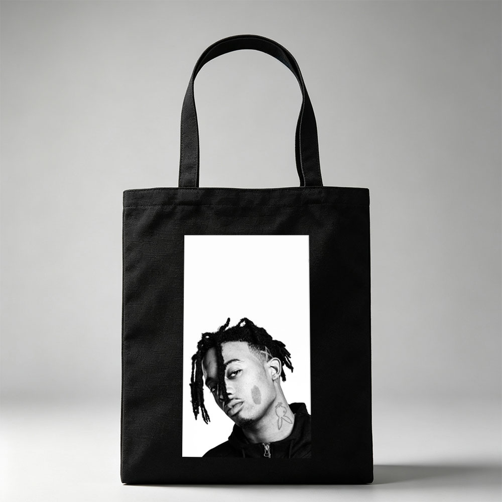 XXXTentacion in a striking black and white portrait with dreadlocks and neck tattoo, captured in a contemplative side profile. - Canvas tote bags