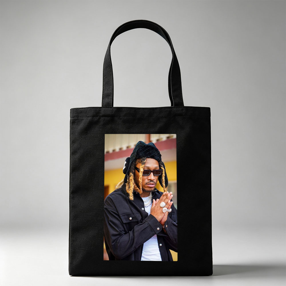 Wiz Khalifa in a stylish urban look with dreadlocks, sunglasses, and layered jewelry, hands clasped in front of a colorful building. - Canvas tote bags