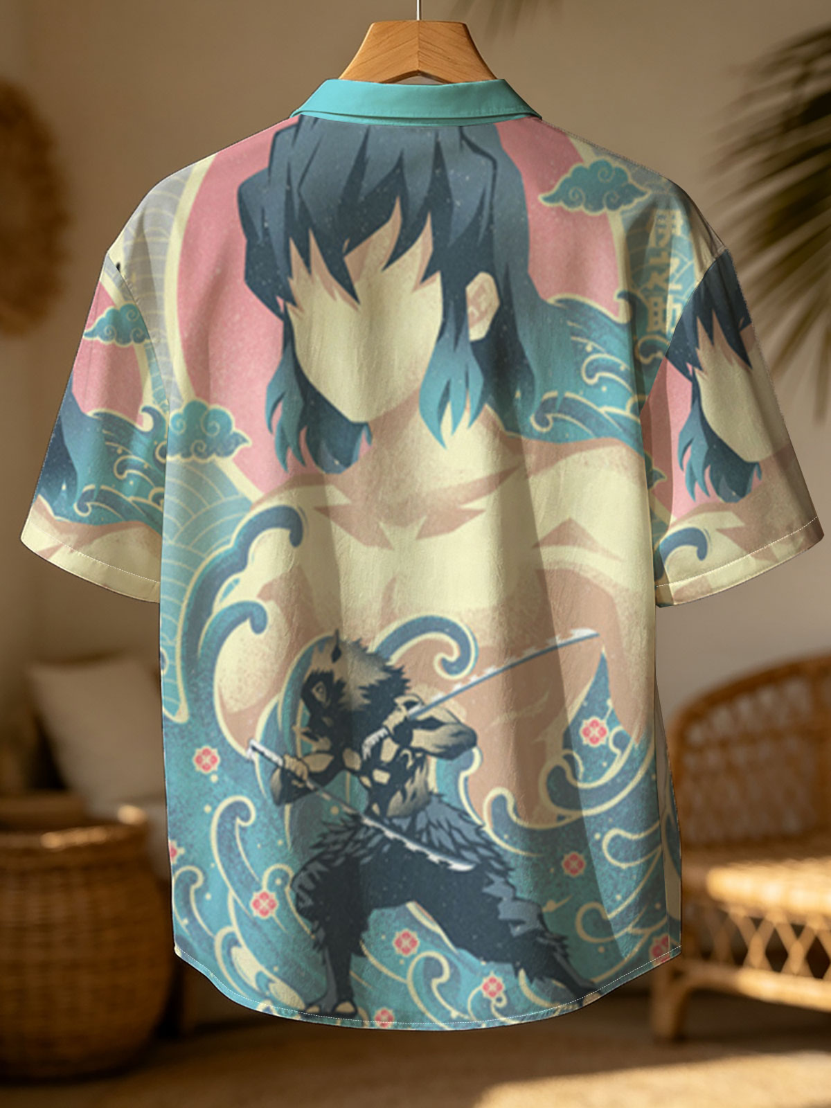 Inosuke Hashibira from Demon Slayer: Kimetsu no Yaiba, depicted in a dynamic pose with his twin swords, set against a stylized wave and sun background. -  Shirt