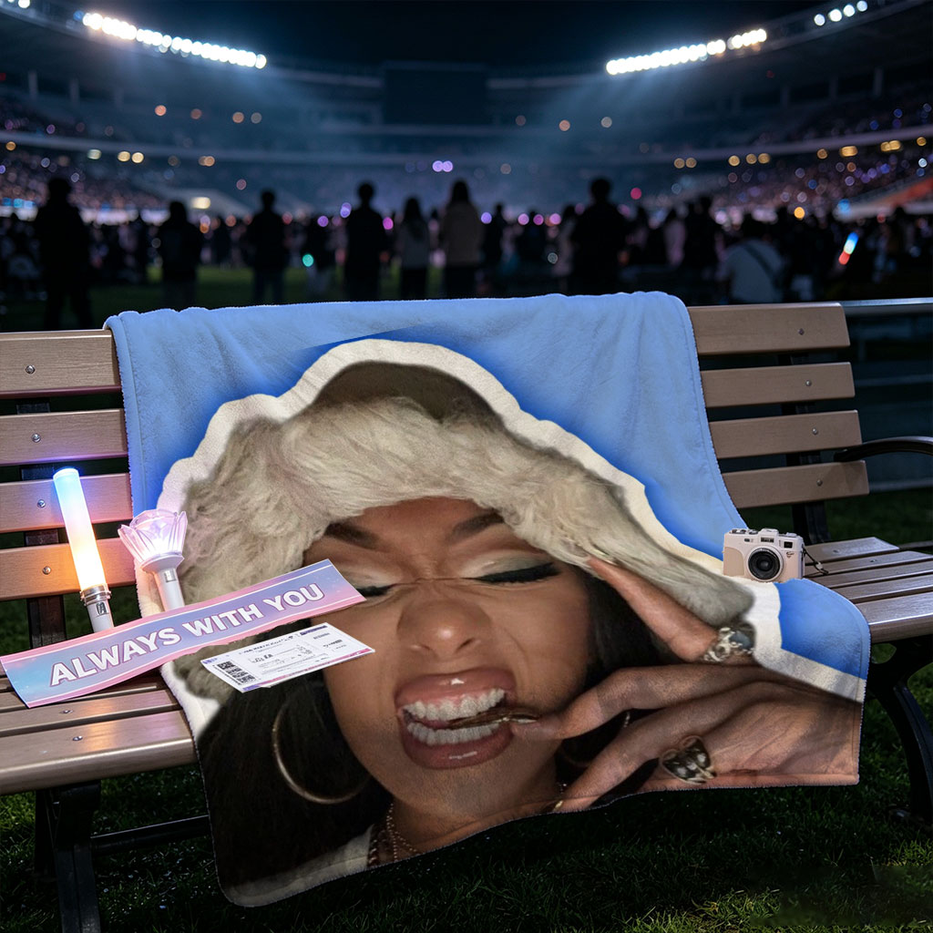 Doja Cat in Festive Mood Wearing Fur Hat and Gold Jewelry Against Blue Background - Blankets