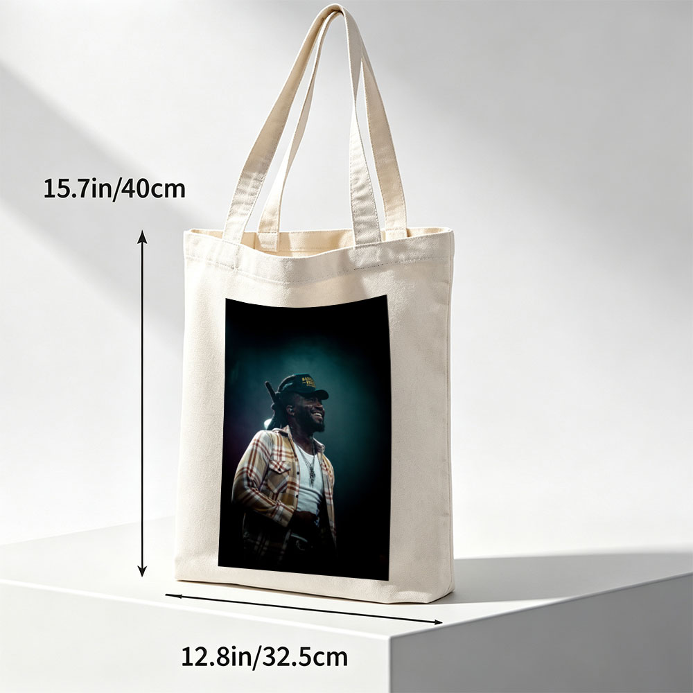 Burna Boy on Stage Performing with a Smile in a Plaid Shirt and Cap - Canvas tote bags