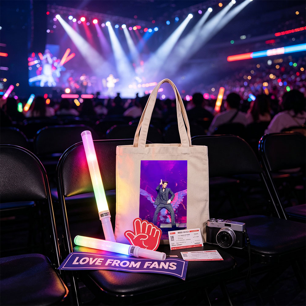 Adam Lambert on Stage in a Striped Suit with Dramatic Wing Props Under Purple Lighting - Canvas tote bags