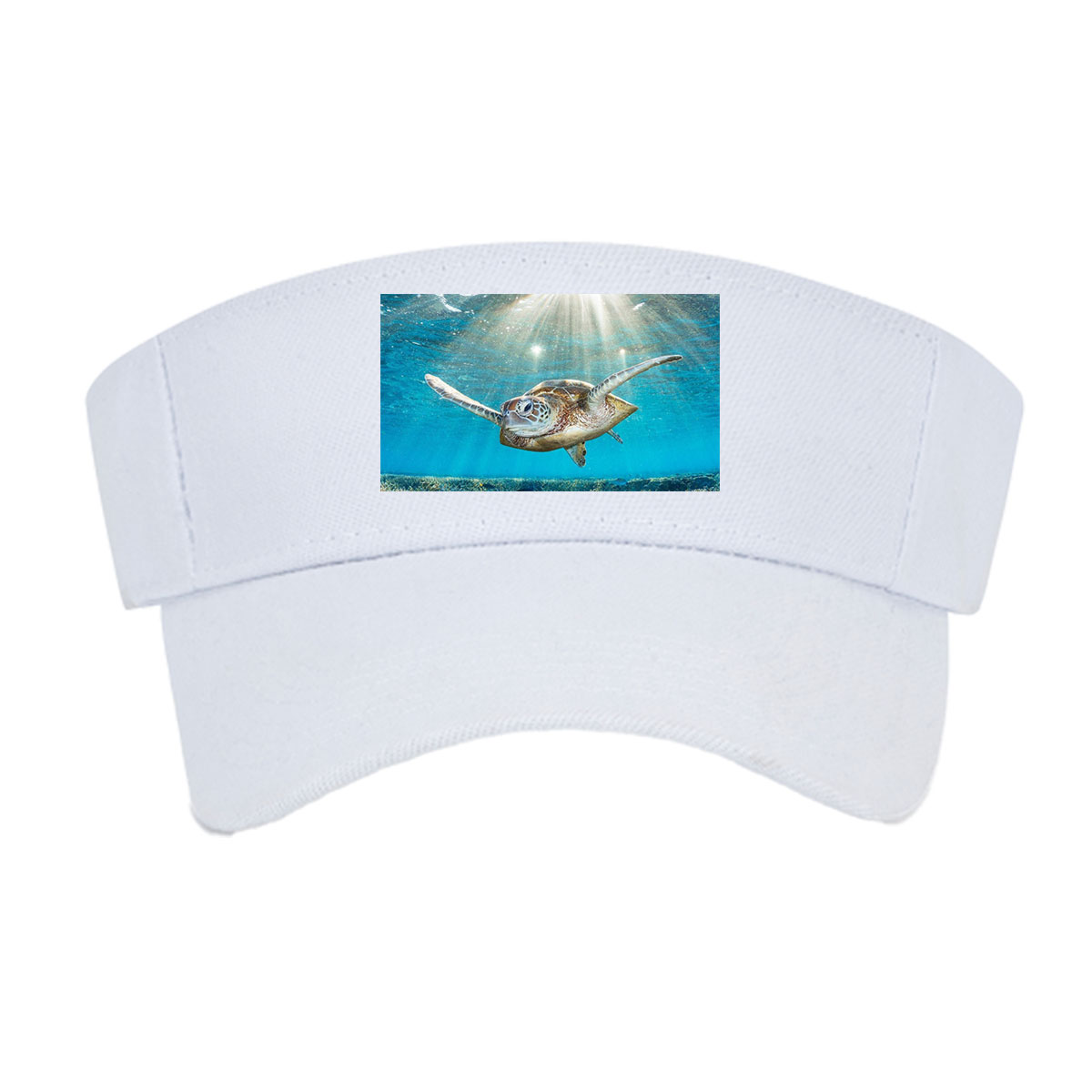 Sea turtle glides through sunlit coral reef -  Visor cap