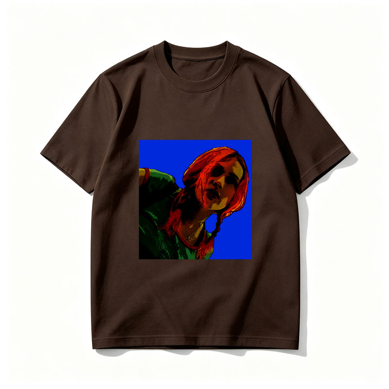 Red-Haired Woman in Green Top Against Blue Background - Tee