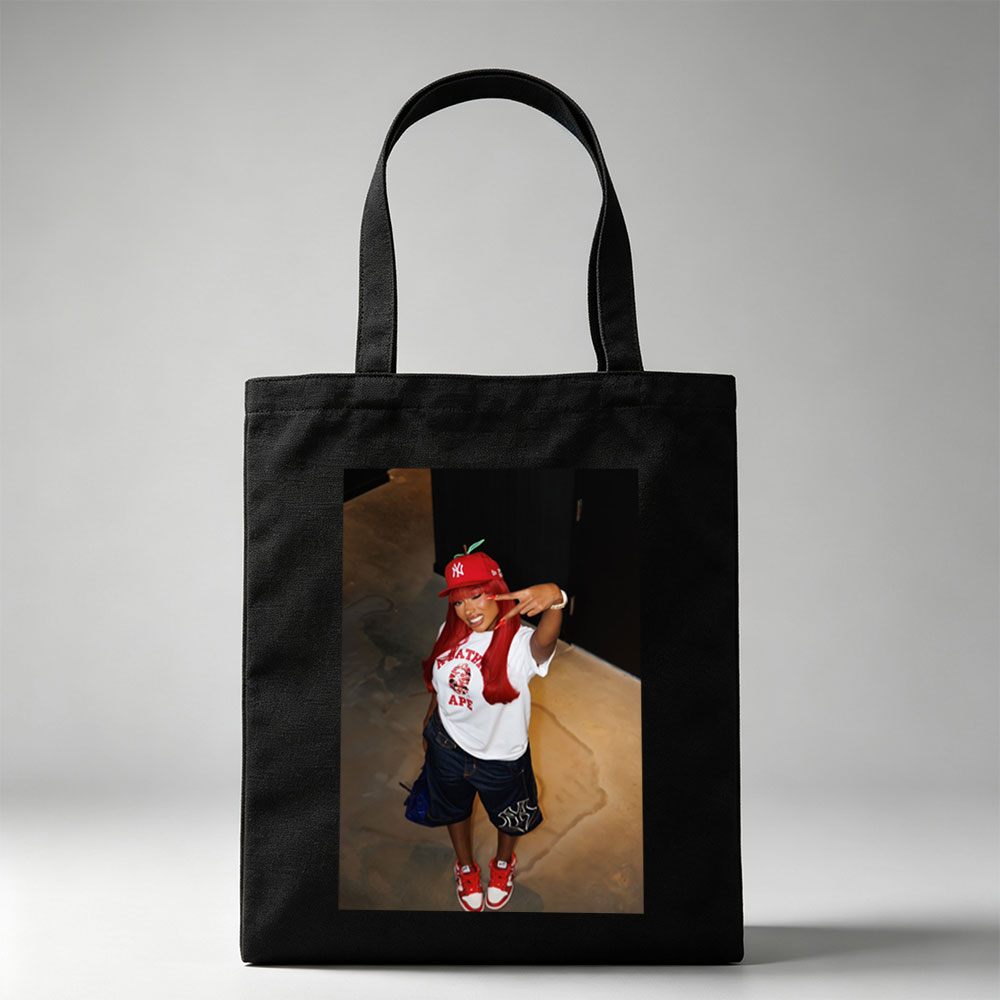 Nicki Minaj in a Red Apple Hat and A Bathing Ape Shirt, Striking a Pose with a Peace Sign - Canvas tote bags