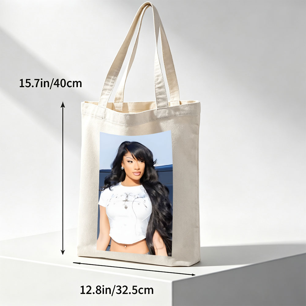 Nicki Minaj in a Stylish White Crop Top with Long Black Hair and Bold Makeup - Canvas tote bags