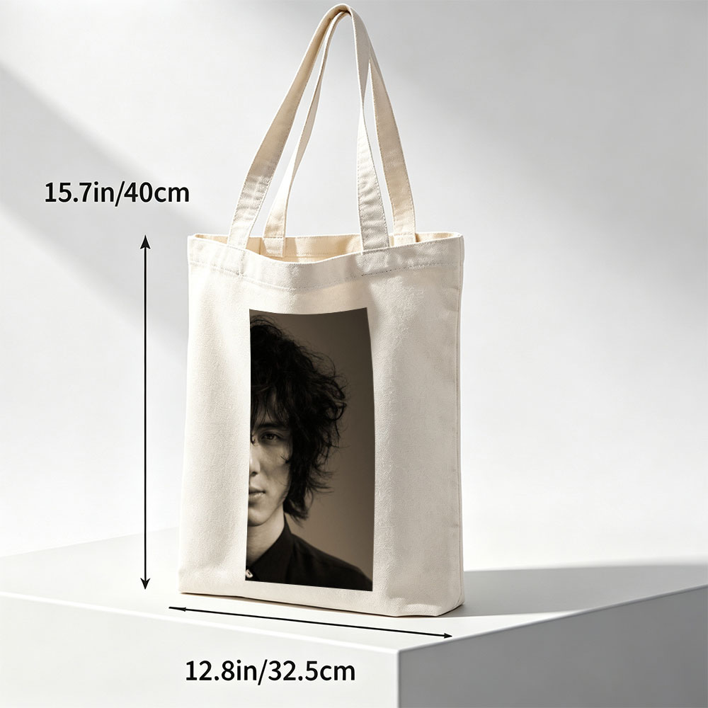 Evan Peters in a Dramatic Portrait with Messy Hair and Intense Gaze - Canvas tote bags