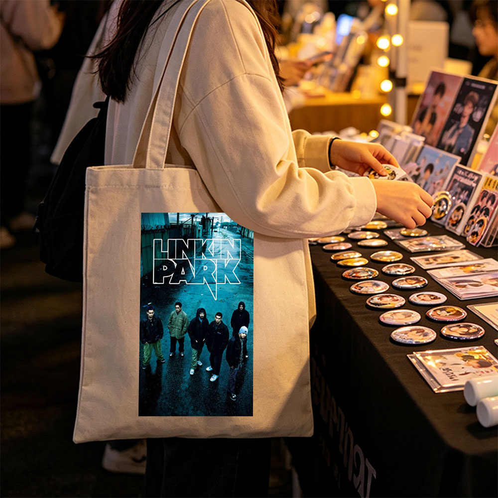 Linkin Park Band Standing in a Rainy Industrial Alleyway with Bold Logo Overlay - Canvas tote bags