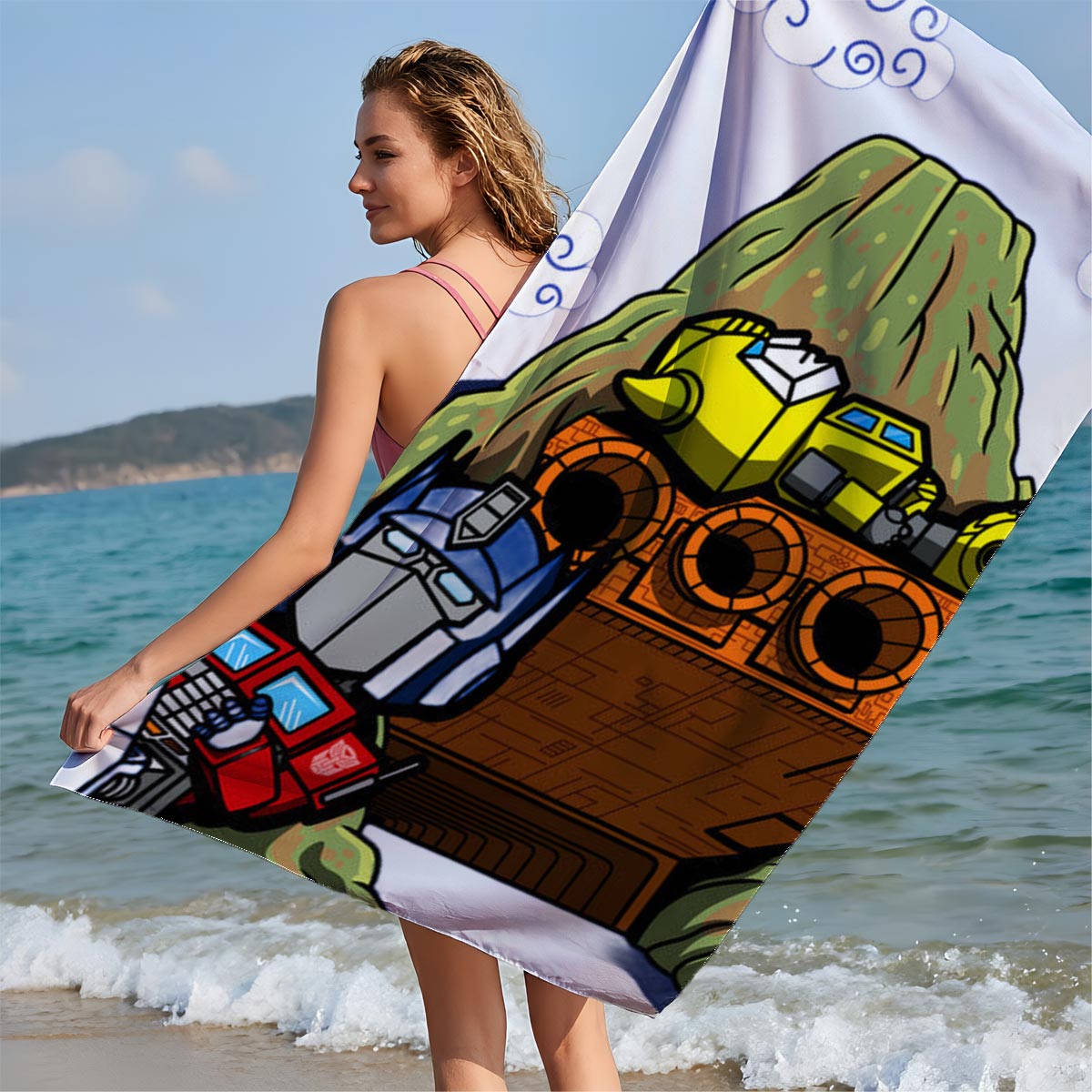 Optimus Prime and Bumblebee atop a mountain with a spaceship, cartoon style - Beach towels