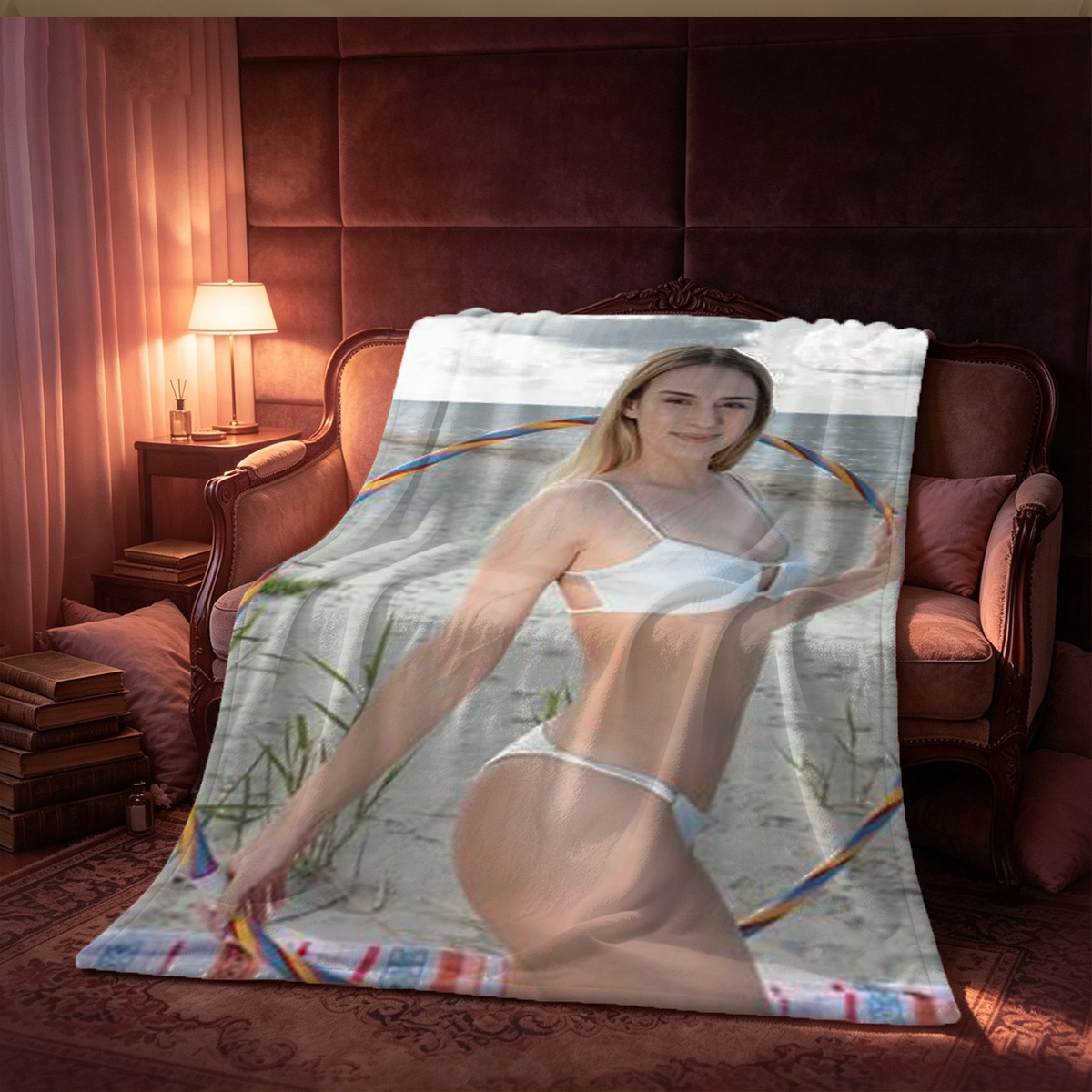 Emma Watson in black lace lingerie kneeling on bed smiling with arms raised. - Blanket