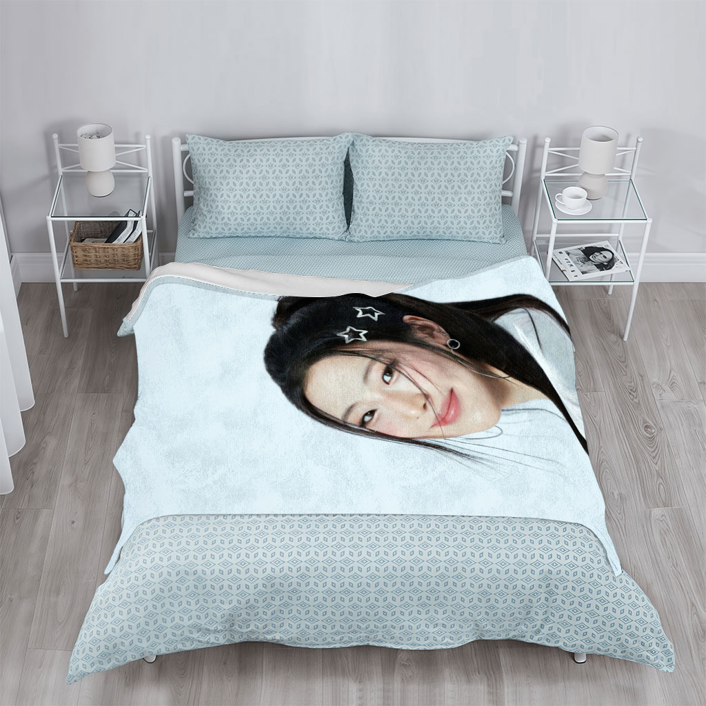 Korean Actress in White Outfit with Star Hair Clips Smiling Softly Against Light Blue Background - Blankets