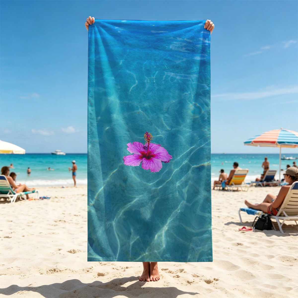 Pink hibiscus floating on crystal clear turquoise water - Beach towels