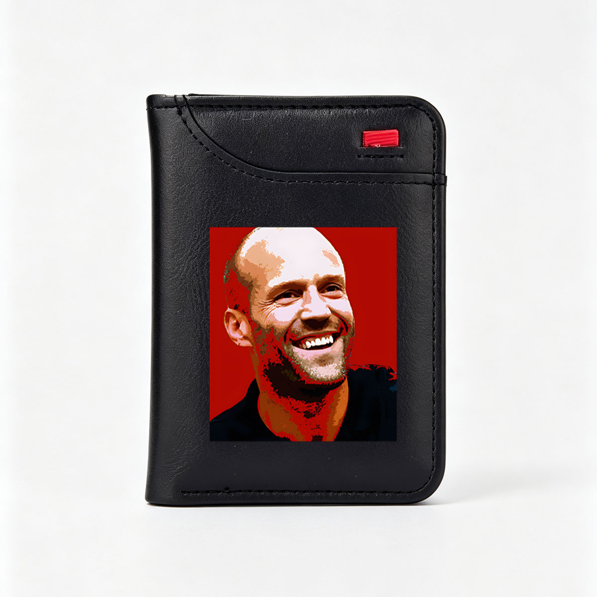Jesse Ventura, former Governor of Minnesota and professional wrestler, smiling against a red background. - Vertical Style Wallet