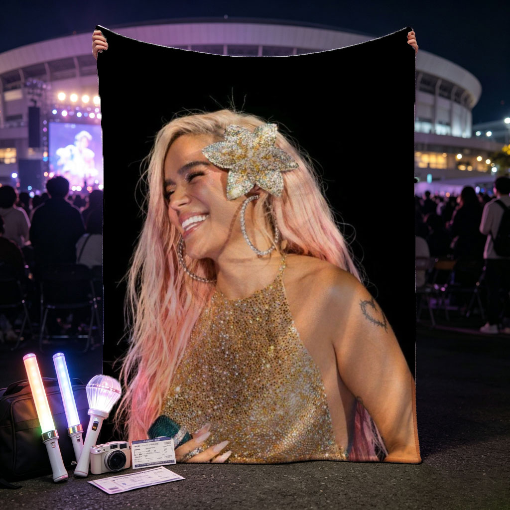 Demi Lovato on Stage in a Sparkling Gold Dress with Pink Hair and Flower Accessory - Blankets