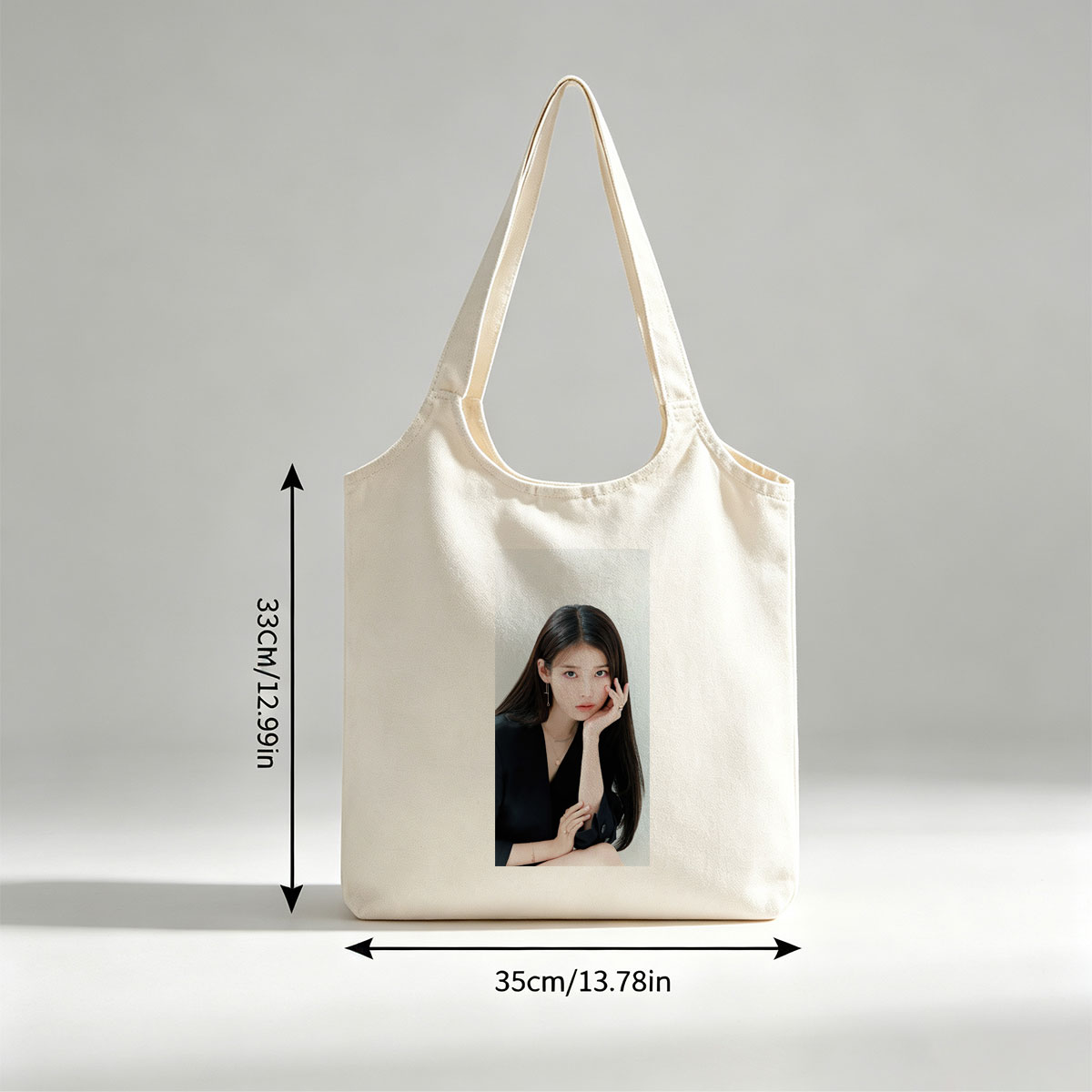 IU in a Minimalist Portrait with Elegant Black Attire and Delicate Jewelry - Canvas shoulder bags/