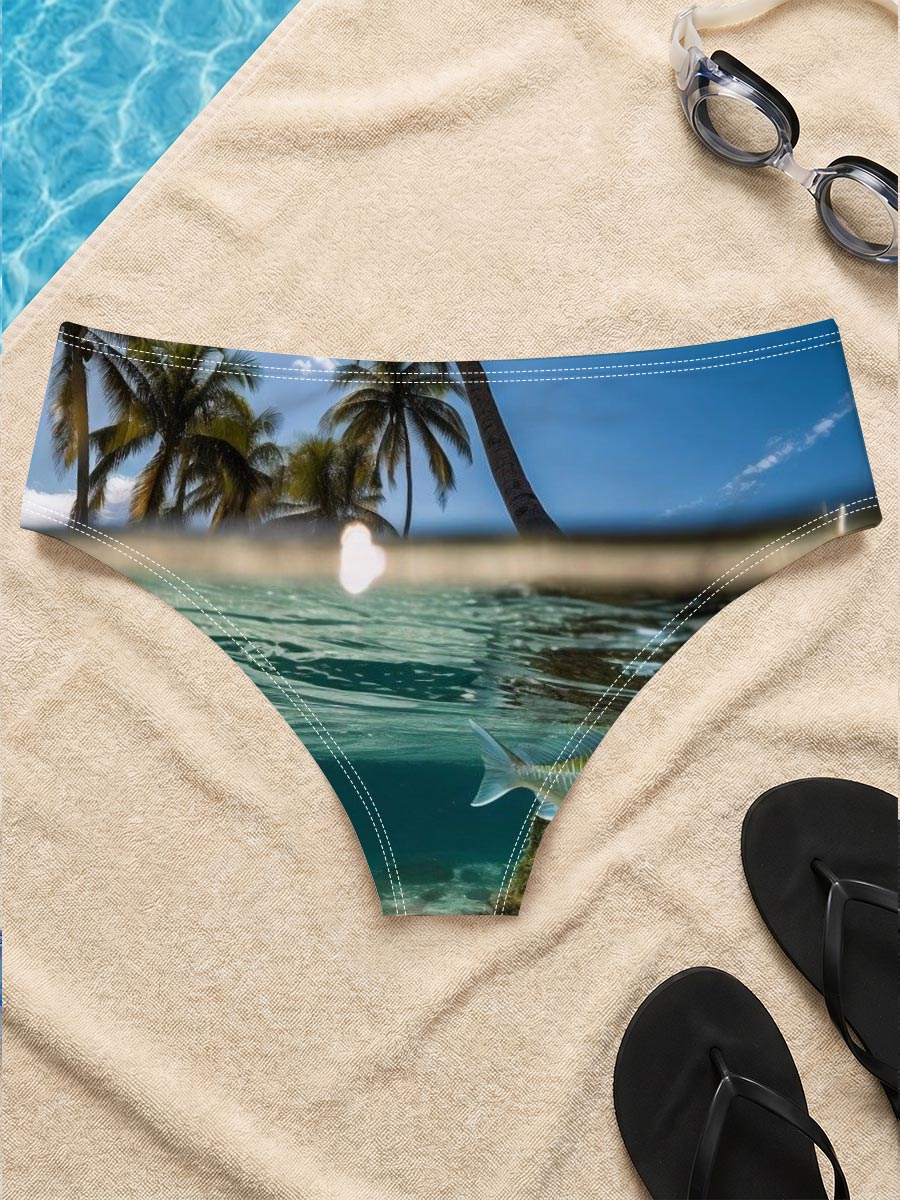Tropical paradise with palm trees and a fish swimming underwater -  Men's swim trunks