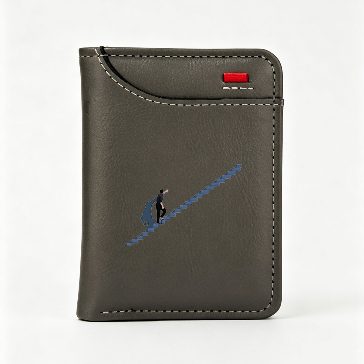 Man Ascending Staircase in Dark Setting - Vertical Style Wallet
