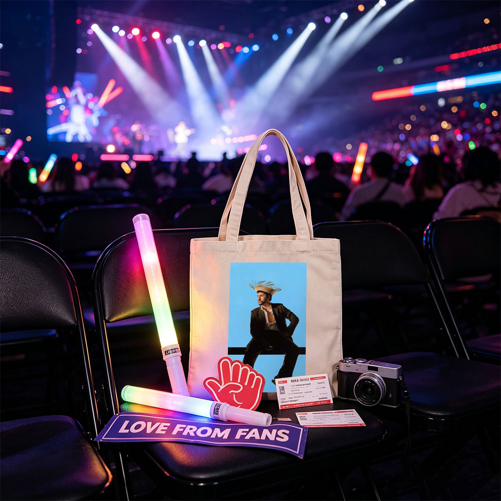 Bad Bunny in a Bold Fashion Statement Wearing a Straw Hat and Suit Against a Blue Background - Canvas tote bags