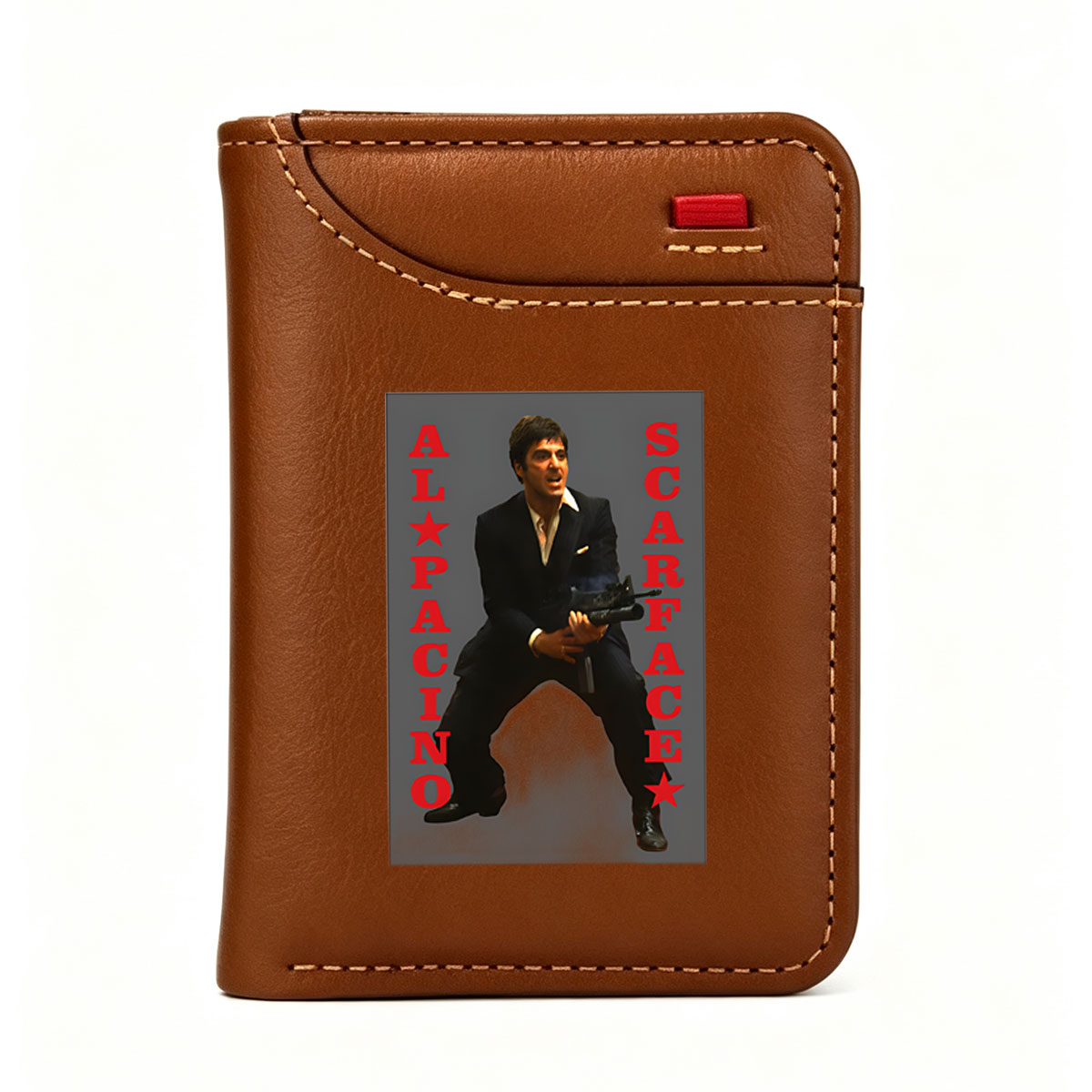 Al Pacino as Scarface, iconic gangster film character, holding a machine gun in a dramatic pose. - Vertical Style Wallet