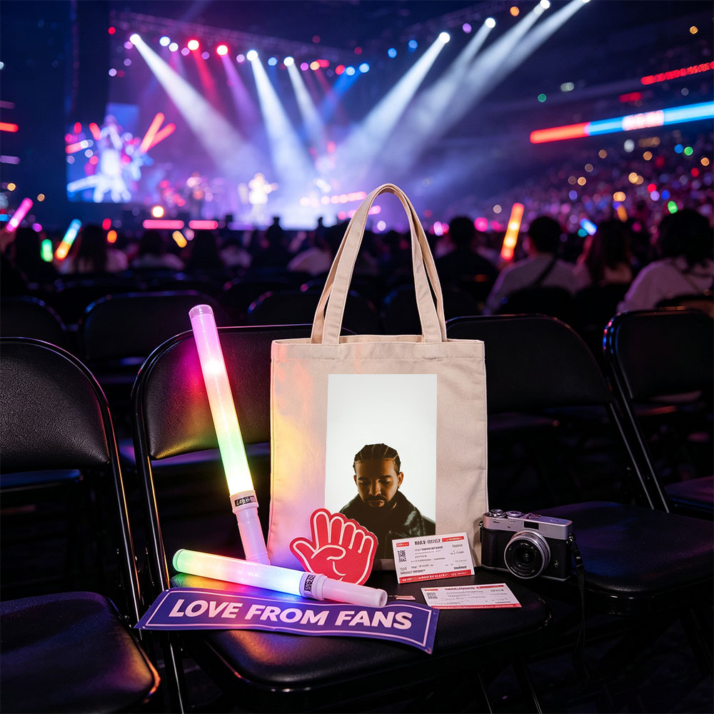 Drake in a Moody Portrait Wearing a Black Leather Jacket with Braided Hair and a Contemplative Expression - Canvas tote bags
