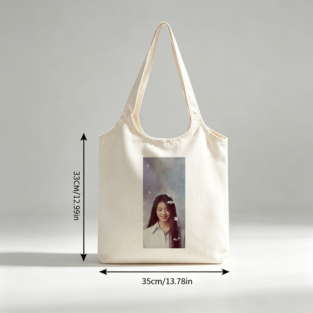 IU in a Dreamy Floral Scene with White Flowers Floating Around Her - Canvas shoulder bags/