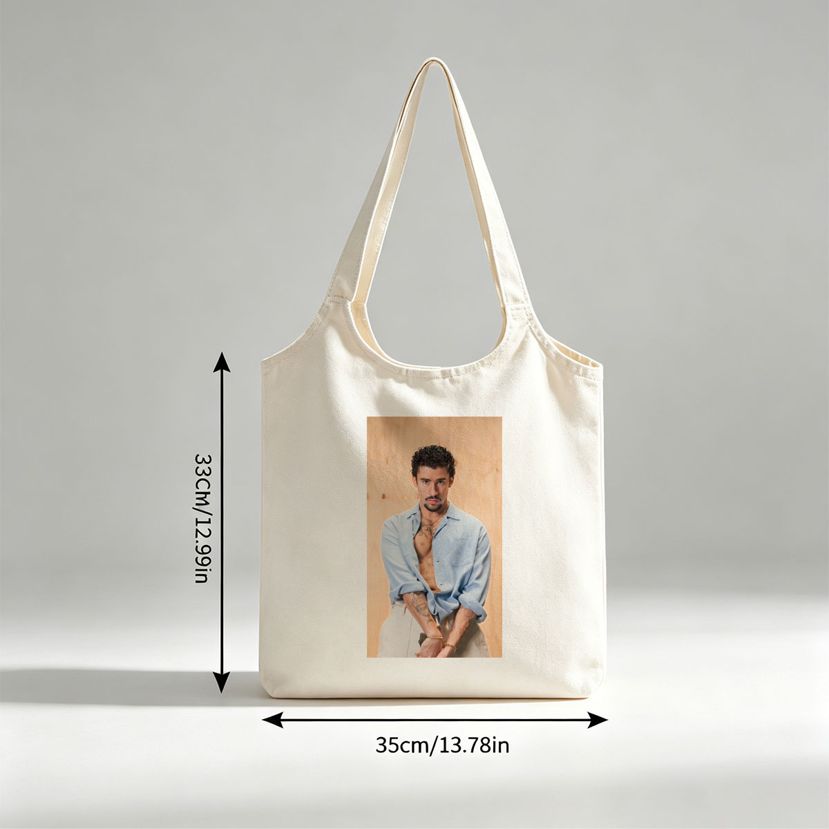 Bad Bunny in a Casual Pose Wearing an Open Light Blue Shirt and White Pants with Visible Tattoos - Canvas shoulder bags/