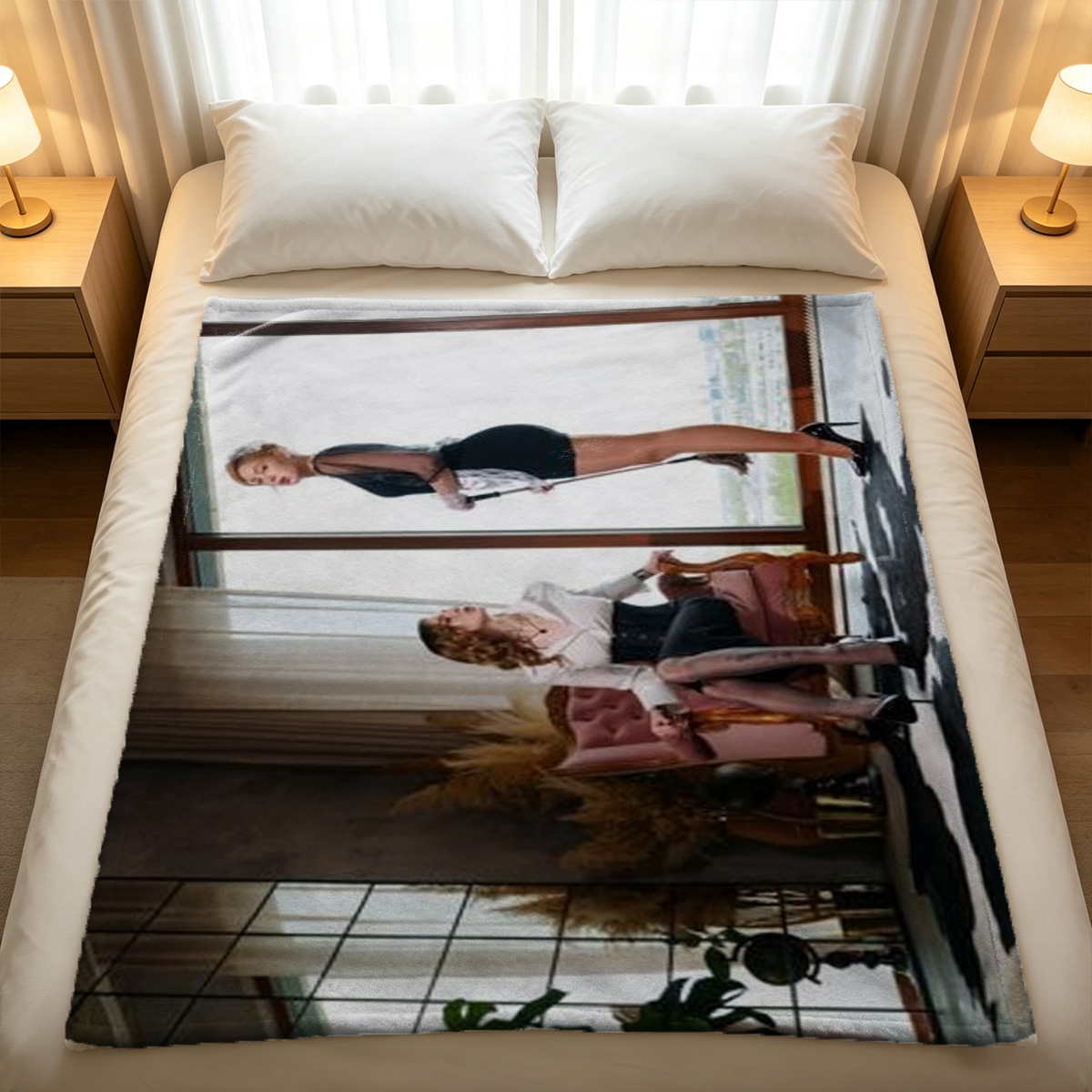 A woman in a white shirt lying seductively on a bed. - Blanket