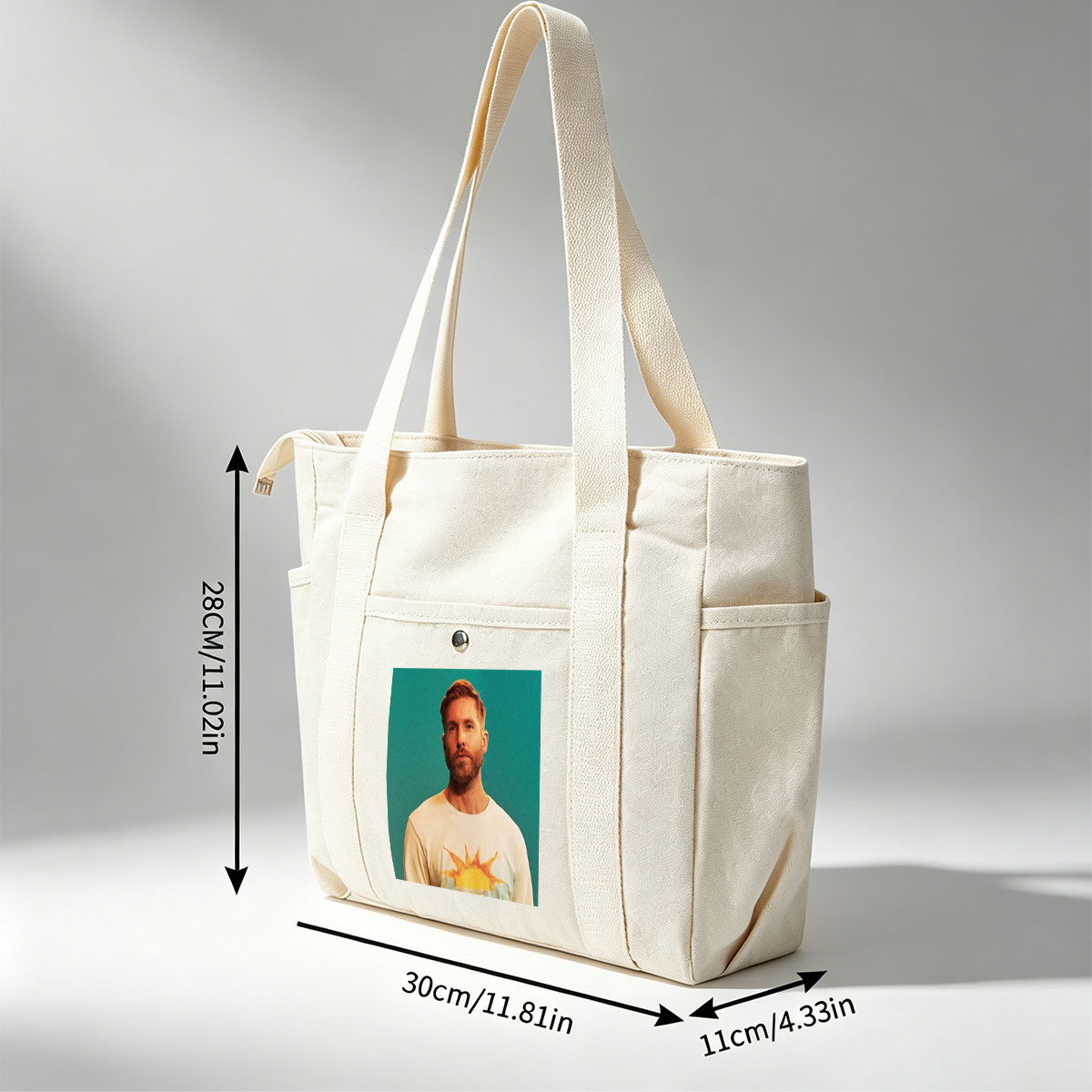 Calvin Harris in a Sun-Themed T-Shirt Against a Teal Background - Multi-pocket bags